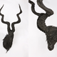 Image for article titled This Artist Turns Old Tires Into Dark, Disturbing Nightmare Monsters